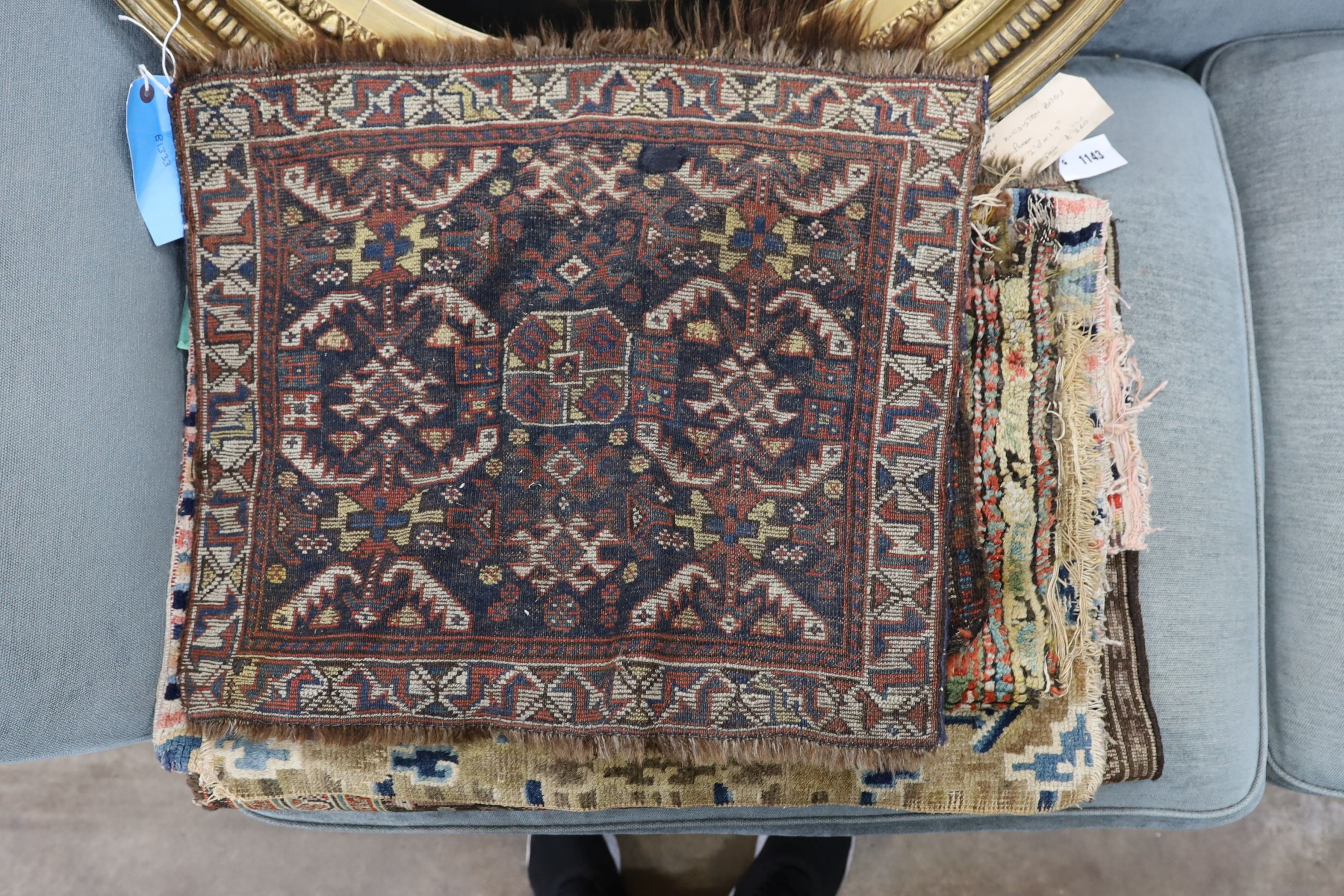 A quantity of Afghan, North West Persian and Chinese wool bag faces.